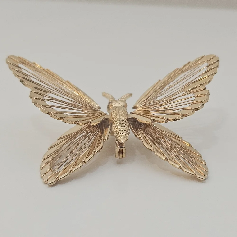 Vintage Monet gold tone butterfly brooch signed